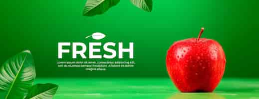 Бесплатный PSD Баннер с яблоком и листьями с текстом на зеленом фоне