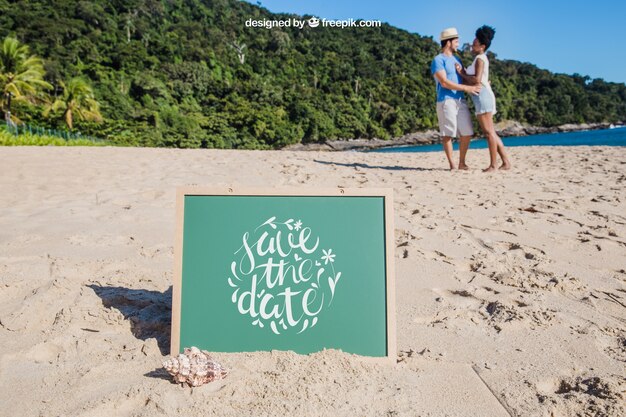 Beach concept with slate sticking in sand