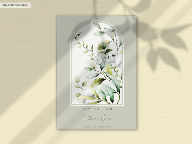 Beautiful watercolor wedding invitation card with greenery leaves and white flower