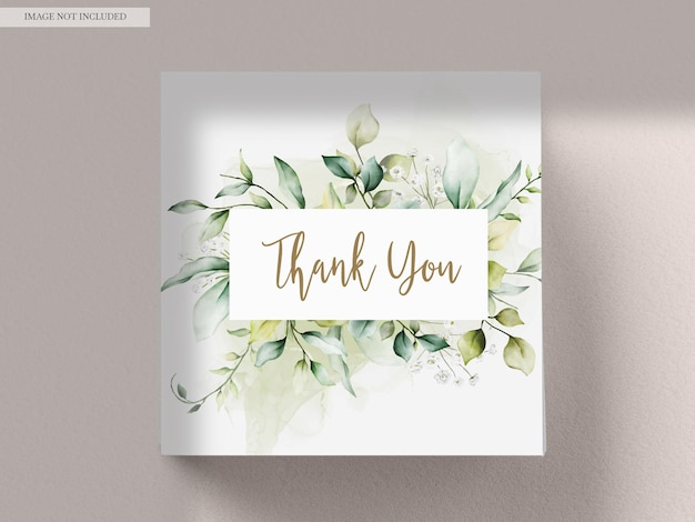 無料PSD 緑の葉と白い花を持つ美しい水彩画の結婚式の招待状