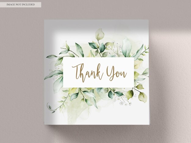 beautiful watercolor wedding invitation with greenery leaves and white flower