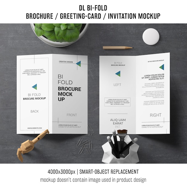 Bi-fold brochure or invitation mockup with still life concept