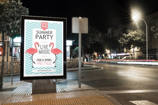 Billboard mockup in city at night