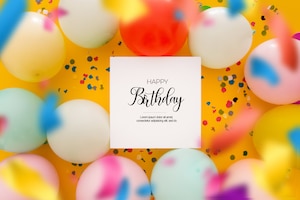 免费PSD生日背景与一个不集中的五彩纸屑和气球在黄色
