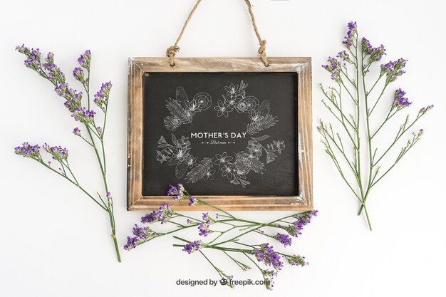 Blackboard mockup design with flowers