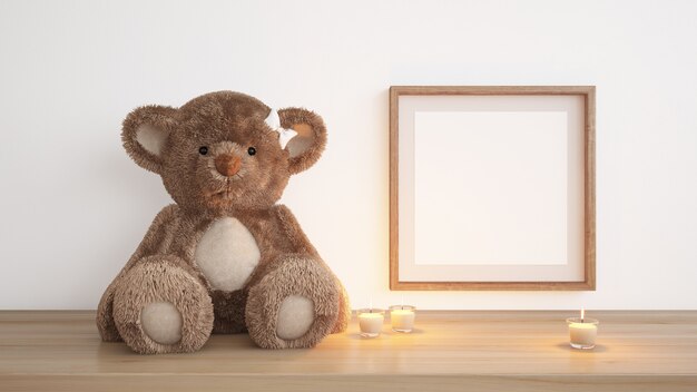 blank frame with teddy bear and candles