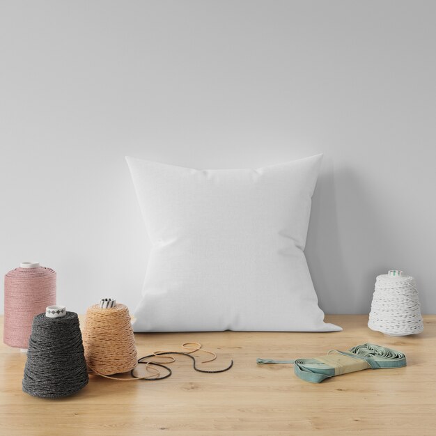 Blank pillow on wooden table