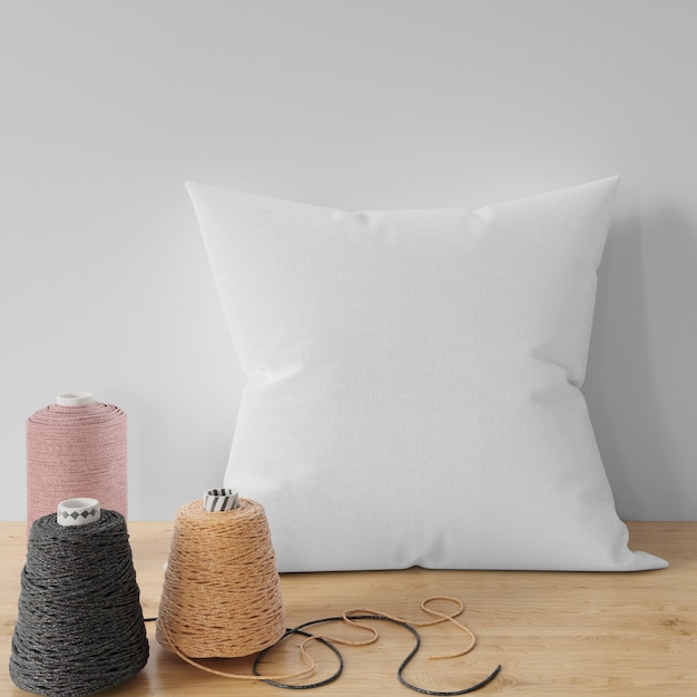 Blank pillow on wooden table