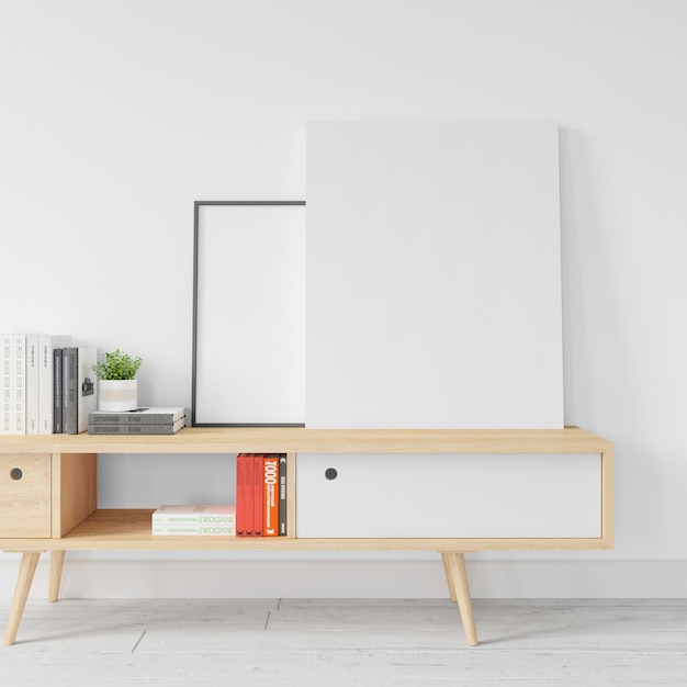 Blank white frame mockup on wooden table