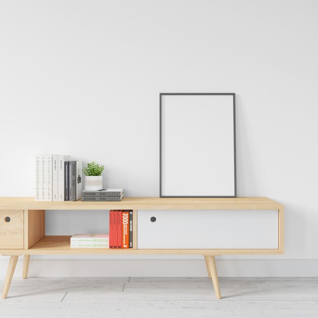 Blank white frame mockup on wooden table