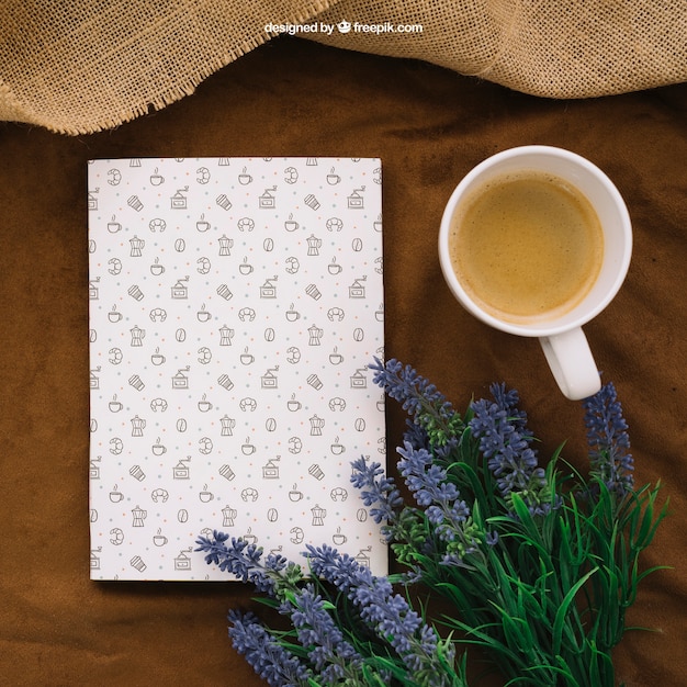 Free PSD book cover composition with coffee and flowers