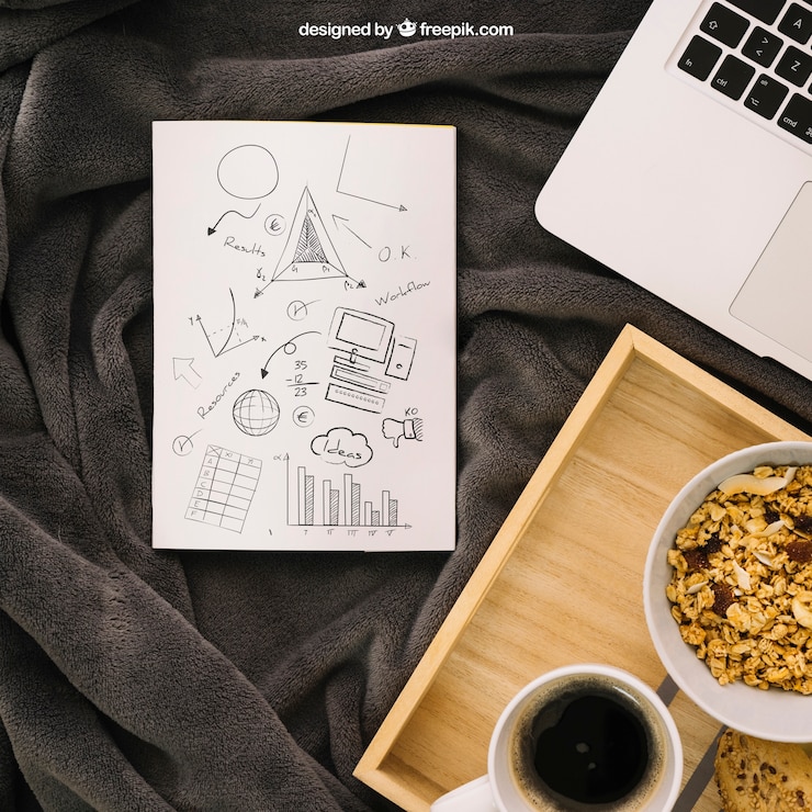 Free PSD book cover composition with laptop and breakfast