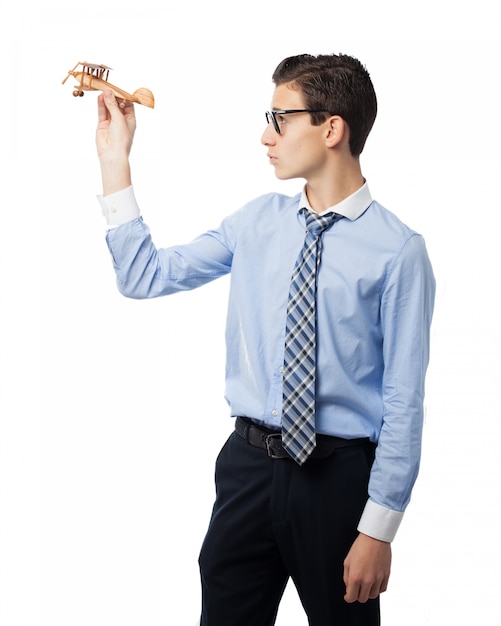 Boy with a wooden plane