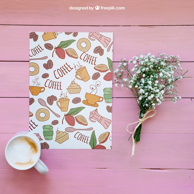 PSD gratuito mockup colazione con carta e fiori