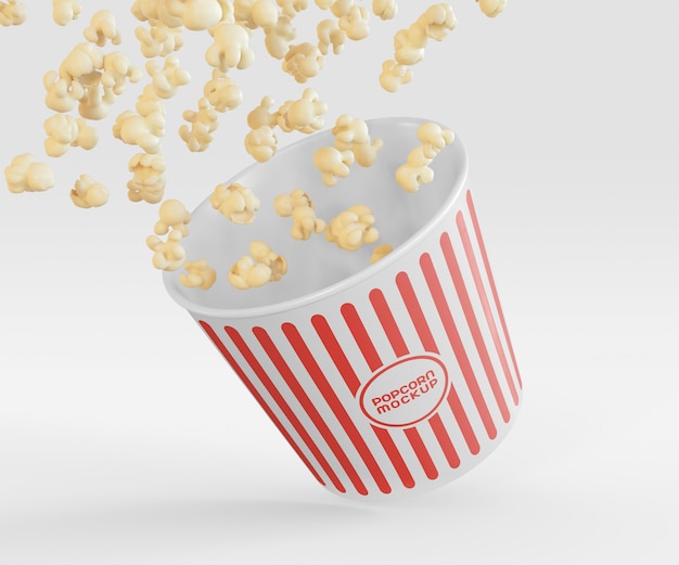 PSD gratuito secchio con mockup volante di popcorn