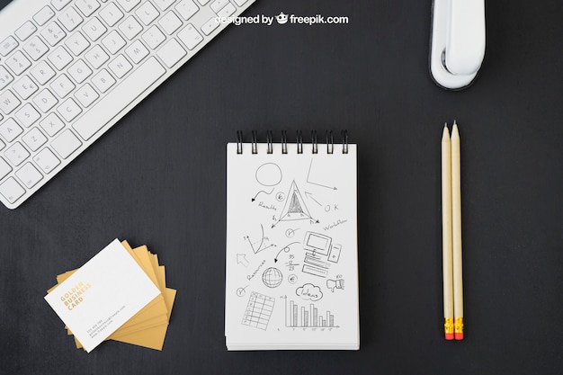 business cards, office desk and pencil drawings