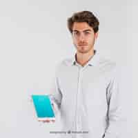 Free PSD businessman showing tablet