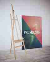 Free PSD canvas on wooden floor mock up