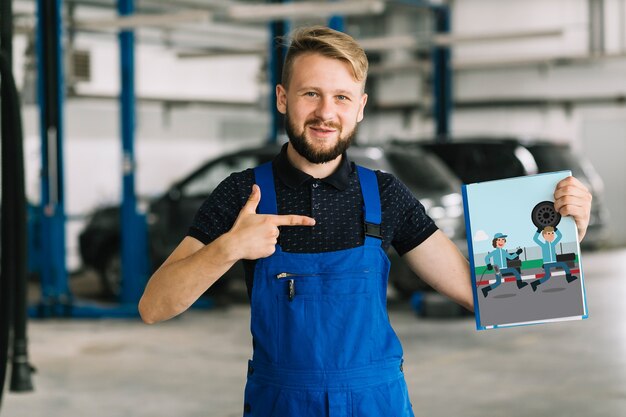 Free Psd Car Mechanic Holding Cover Mockup