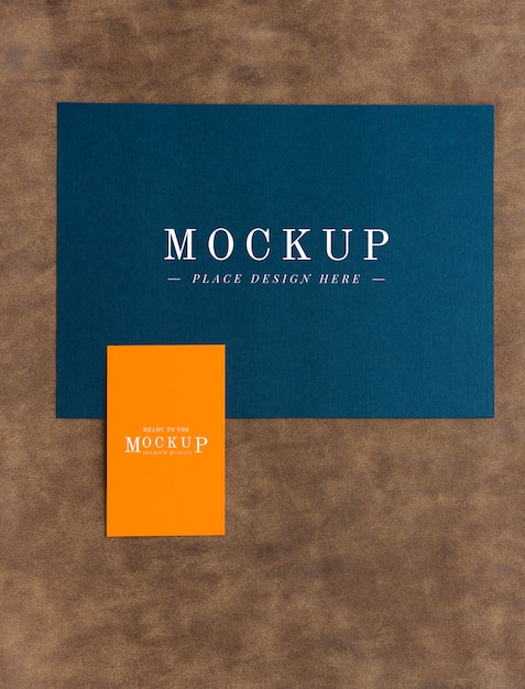 Free PSD card and tab mockup on brown leather