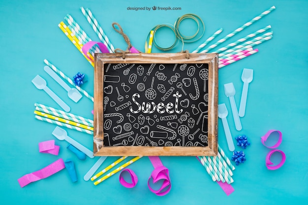 Free PSD celebration composition with slate in middle