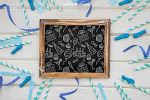 Free PSD celebration decoration with slate and sticks