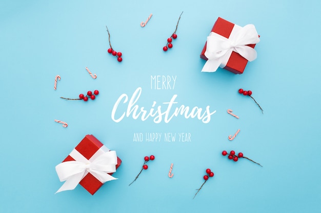 Free PSD circular composition with christmas ornaments on a blue background