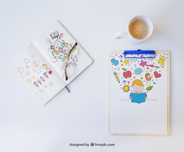 Clipboard and notebook with colorful drawings