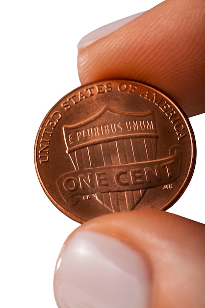 Free PSD close up on coin in hand isolated
