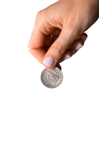 close up on coin in hand isolated