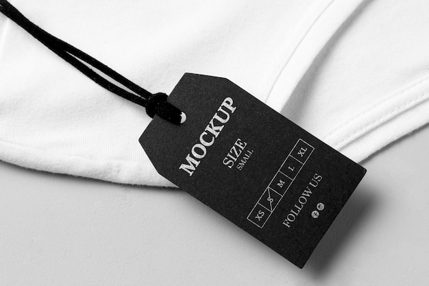 Clothing size black mock-up high view and white towel