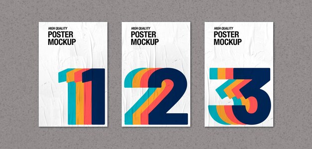 Raccolta di poster accartocciati su mockup di muro di cemento