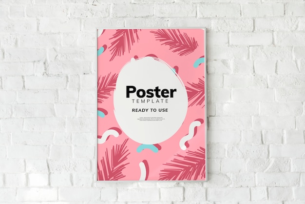 Free PSD colorful poster template on a white brick wall