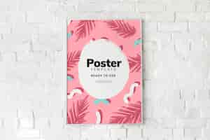 Free PSD colorful poster template on a white brick wall