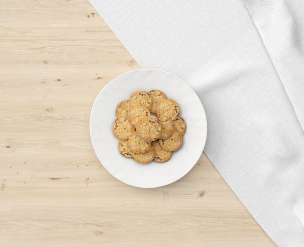 PSD gratuito piatto di biscotti sul tavolo di legno