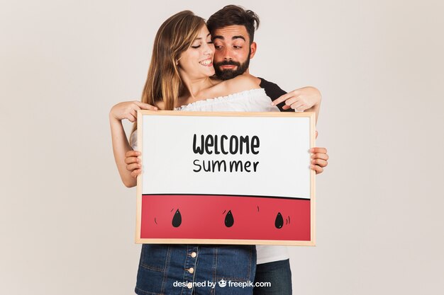 Couple presenting whiteboard