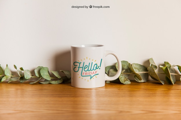 Cup mockup with floral decoration