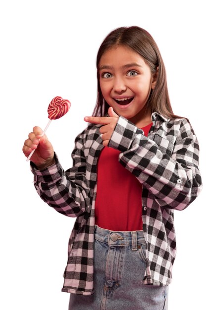 Cute girl holing candies happily