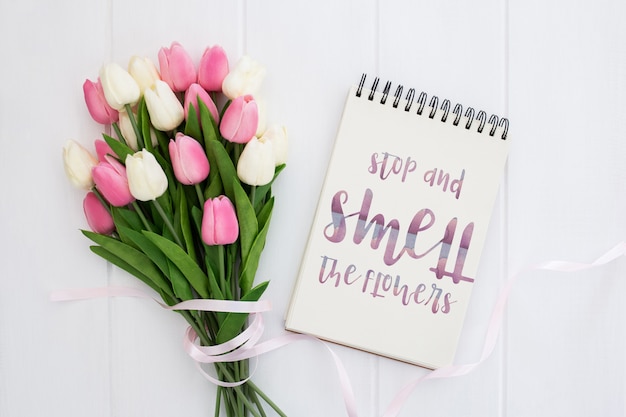 Free PSD cute message on notebook spring concept