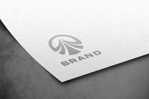 Debossed logo mockup on white paper