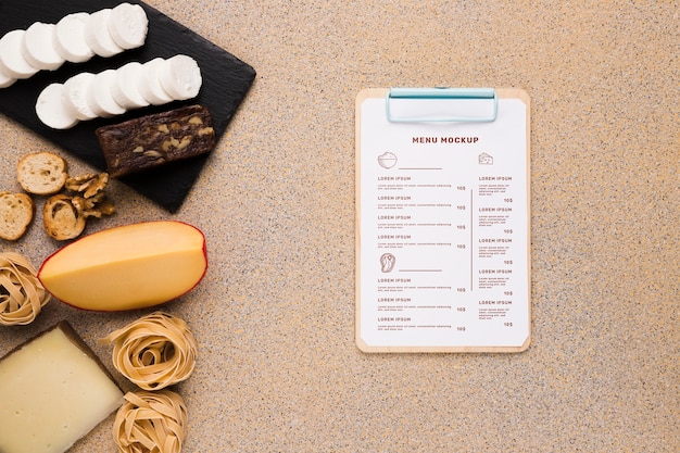 Delicious food arrangement with clipboard mock-up