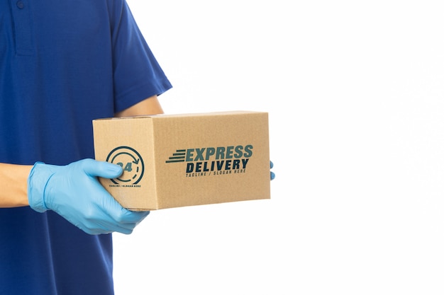 Delivery man hand holding cardboard boxes mockup