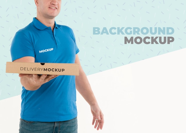 Download Free PSD | Delivery man holding some pizza boxes mock-up
