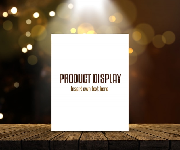 Editable product display background with blank picture on wooden table against bokeh lights