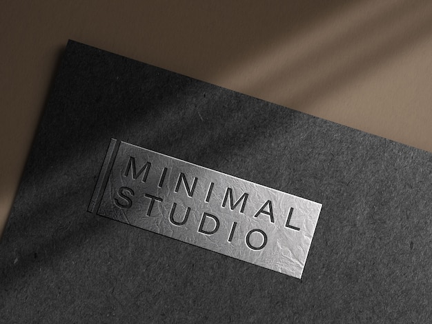 Embossed Silver Logo Mockup on Dark Paper