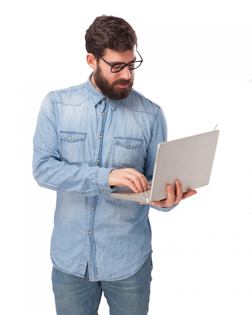 Employee typing on laptop