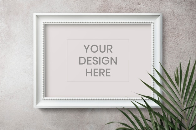 Free PSD empty frame on a wall