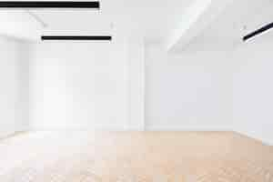 Free PSD empty room scene with blank walls and parquet flooring