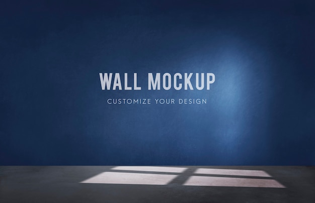 Free PSD empty room with a blue wall mockup