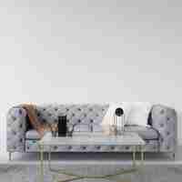 Free PSD empty wall with elegant sofa